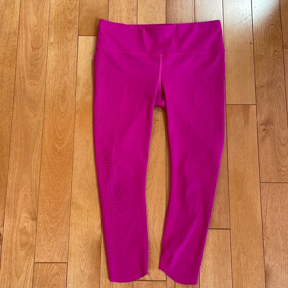 Athleta capri leggings; XS Petite; decorative hole embellishments; raspberry
